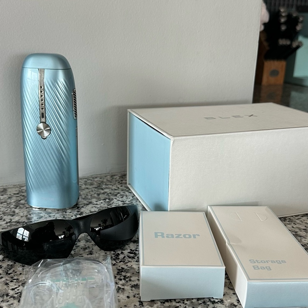 Sleek Blue Hair Removal Device with Accessories